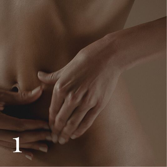 Stomach massage with clenched fists to promote digestion.