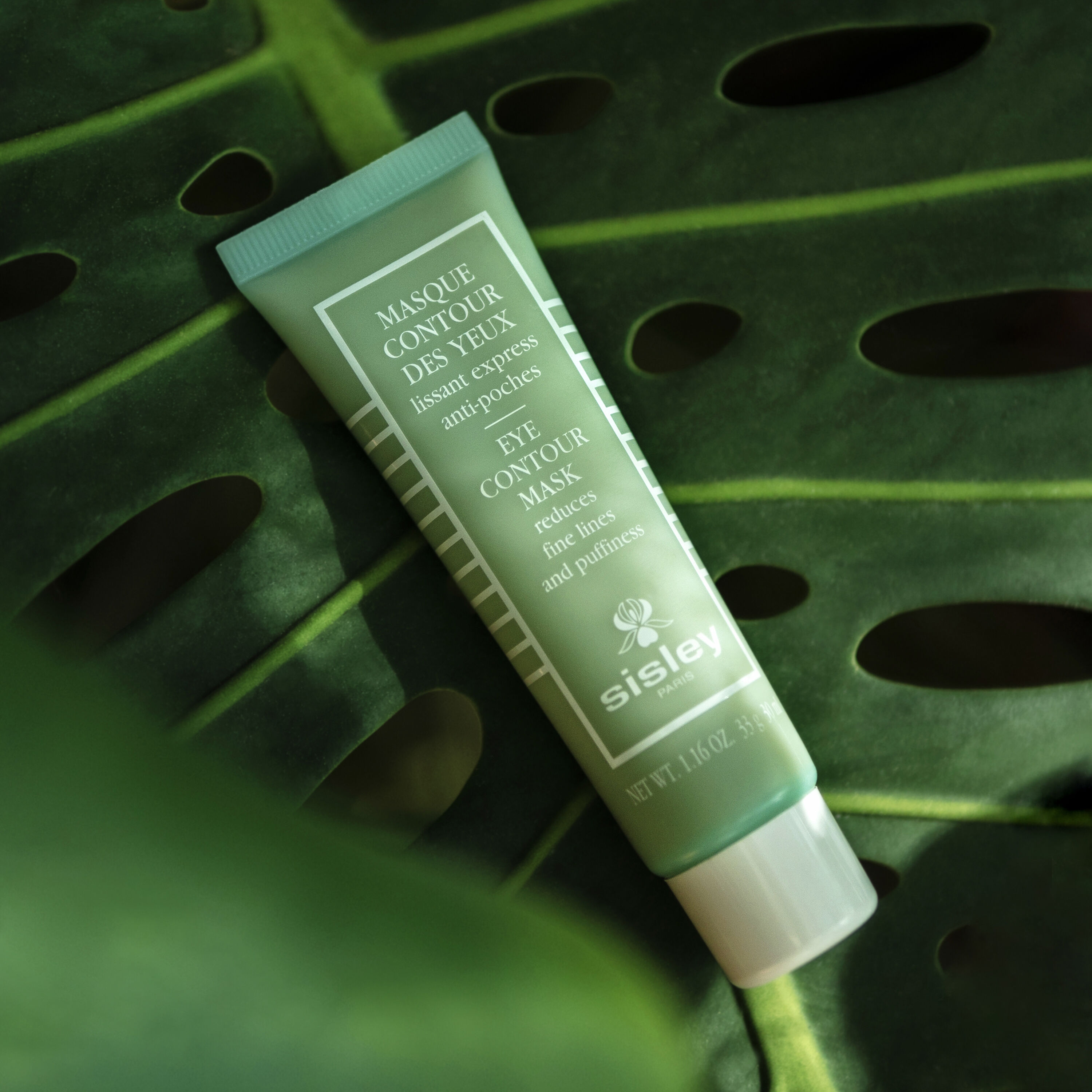Sisley Eye Contour Mask 30ml in an elegant glass jar with gold details, on a clean white background. - thumbnail 2